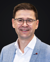 Porträt von Oliver Kroll